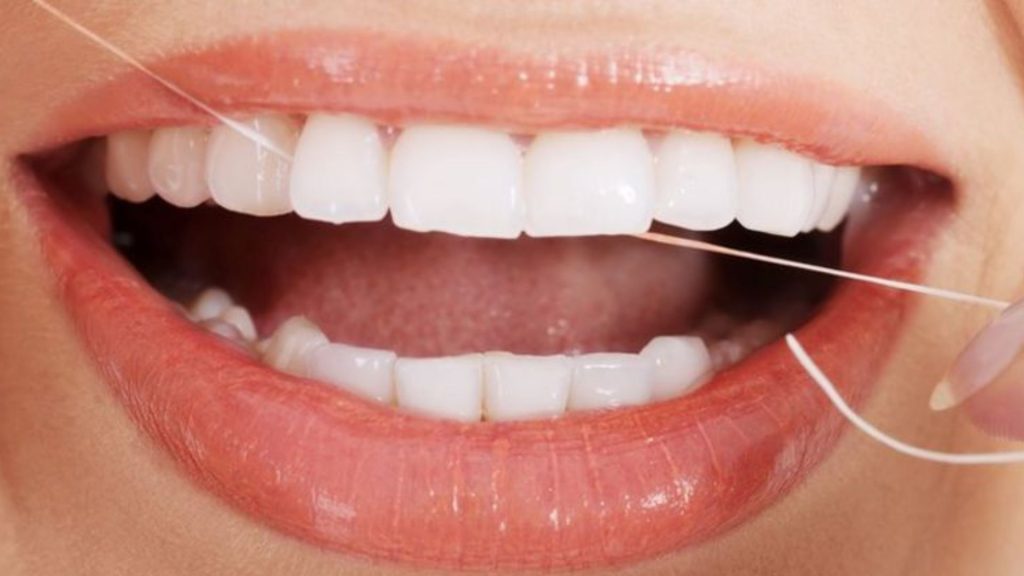 After flossing, what should you do